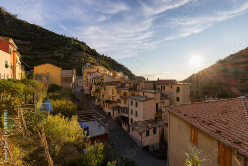 Small touristic town on the coast and farmland  Manarola  Italy. Cinque Terre. Sunny Fall Season day.