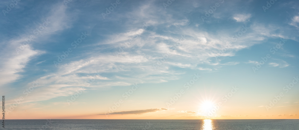 Fototapeta premium Dramatic Colorful Sunset Sky over Mediterranean Sea. Cloudscape Nature Background.
