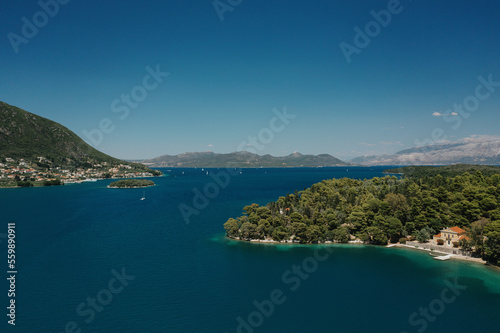 Popular Tourist destination. Bay with boats on Lefkada island. Nydri village. © diignat