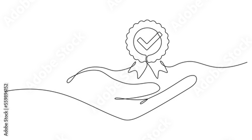 Hand holds award badge continuous line drawing. Approval check sign. Vector illustration isolated on white.