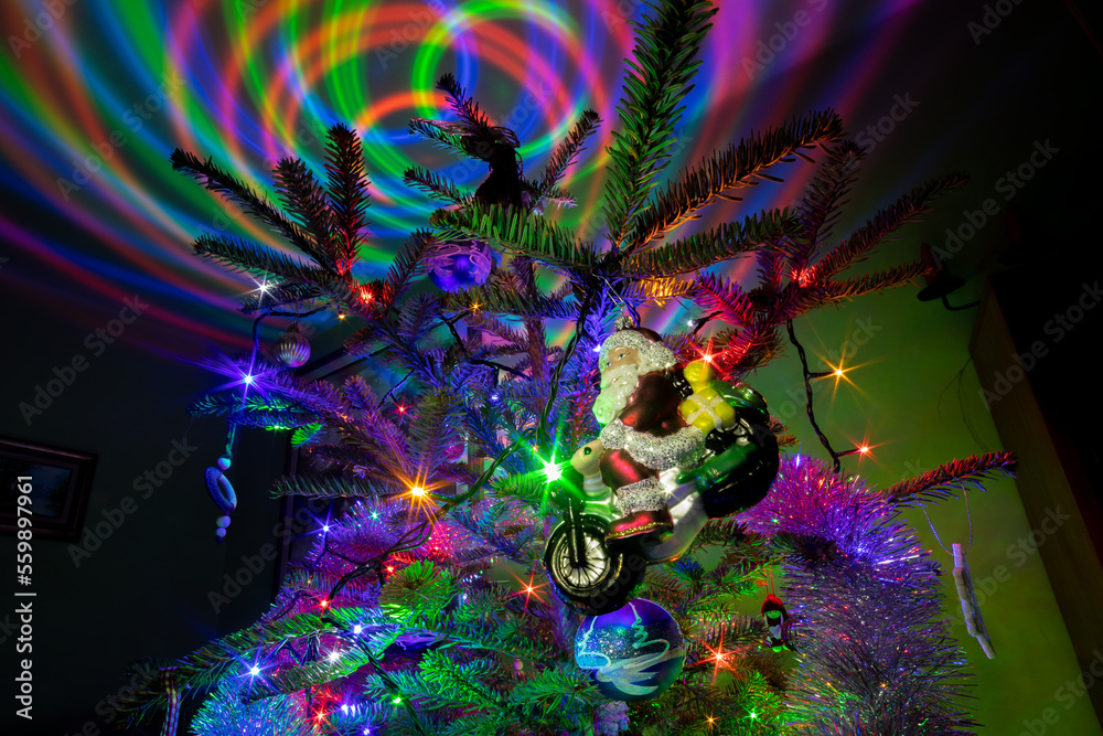 Christmas tree with a lot of lights - obrazy, fototapety, plakaty 