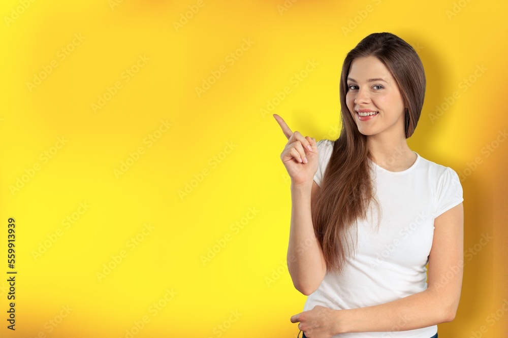 Happy young smile woman posing on color background Happy young smile woman posing on color background