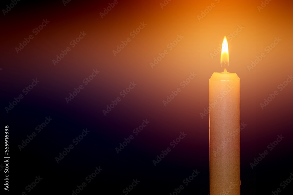 Abstract burning candle on dark background Abstract burning candle on dark background
