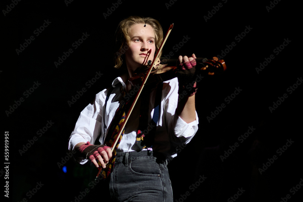 SEWICKLEY, PA, USA - MARCH 2ND 2022: High School students are performing in an annual musical show. SEWICKLEY, PA, USA - MARCH 2ND 2022: High School students are performing in an annual musical show.