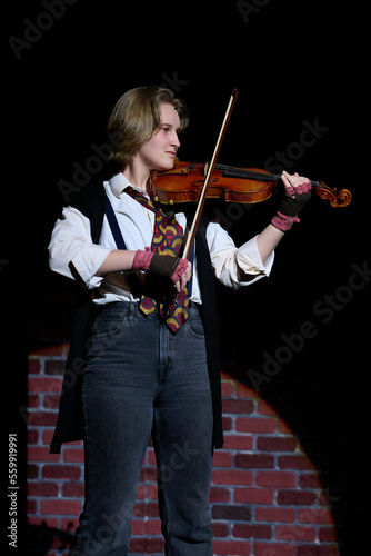 SEWICKLEY, PA, USA - MARCH 2ND 2022: High School students  are performing in an annual musical show.