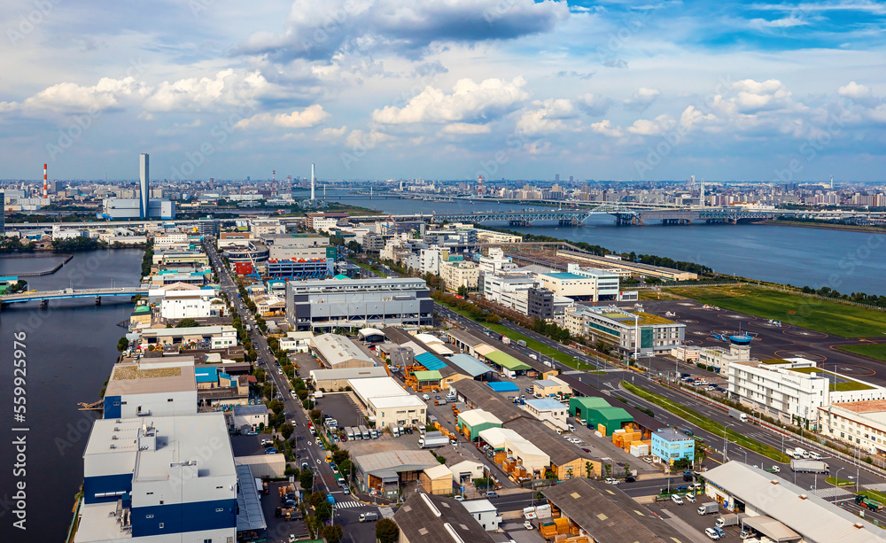 Aerial view of Odaiba Harbor shipping freight docks in Minato City, Tokyo, Japan