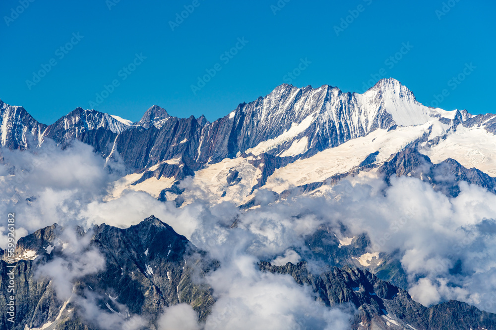 Fototapeta premium Switzerland 2022, Beautiful view of the Alps and Blue Sky around Titlis mountain.