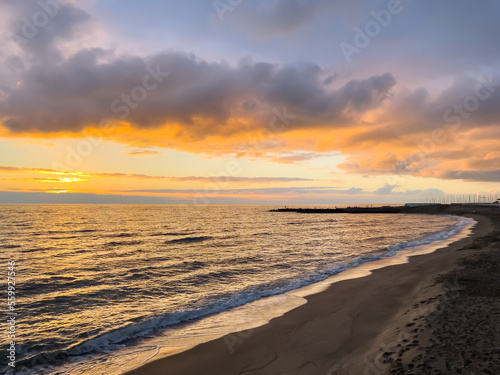 Colourful sunset in Ostia beach during winter  Rome  Italy .