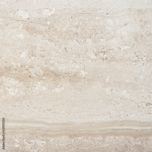Photo of detailed beige natural marble with abstract pattern