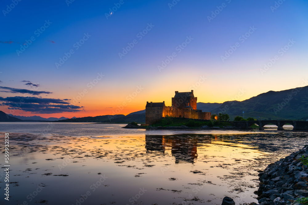 Eilean Donan Castle at sunset in Scotland