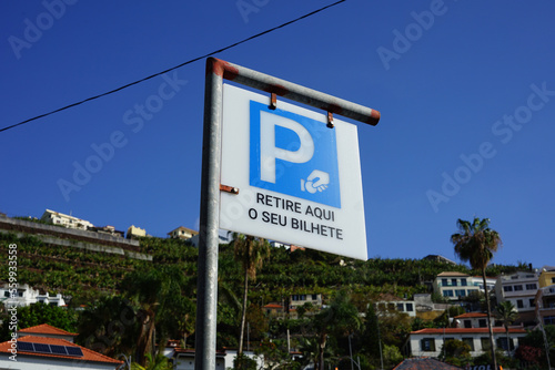 Parking spot - Retire aqui o seu bilhete - Collect your ticket here - sign in Portuguese photo