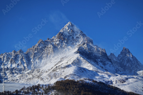 Monviso, 3,842 meters, is the king of the Alps, imposing and majestic in its snowy beauty. A breathtaking view from the village of Ostana in Piedmont, Italy © Mike Dot