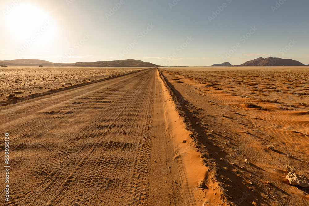 Straight dirt road in Namib Desert, Namibia, Africa