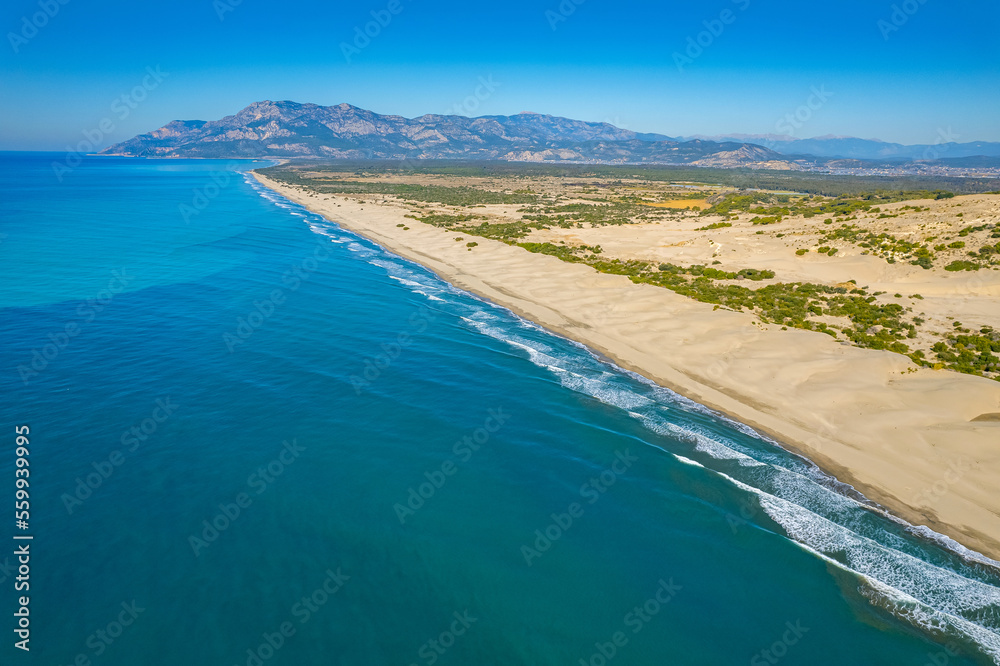 Patara sandy beach with blue sea Antalya Turkey, Aerial top view