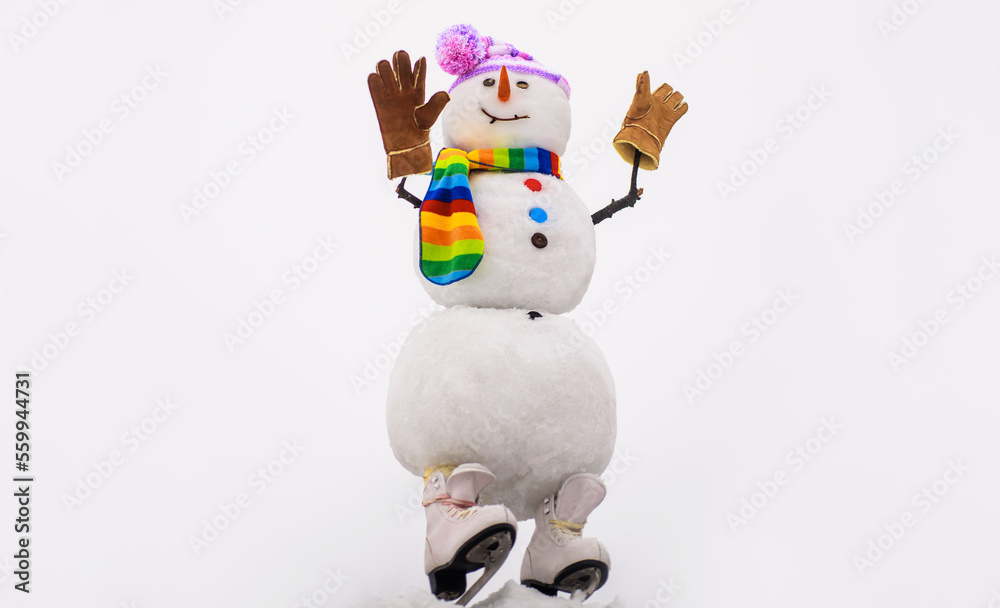 Snowman in hat, scarf and mittens with ice skating. Happy winter holidays.