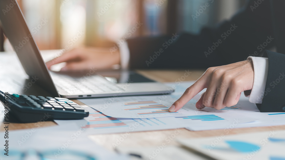 Business people read business statistics chart reports, to analyze and improve corporate strategy, manage financial and marketing documents, update annual budget accounts, company growth data.. Business people read business statistics chart reports, to analyze and improve corporate strategy, manage financial and marketing documents, update annual budget accounts, company growth data..