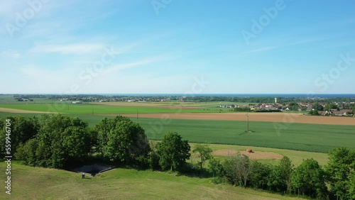 A hedge in the Normandy countryside facing the English Channel in Europe, France, Normandy, towards Arromanches, in summer, on a sunny day. photo