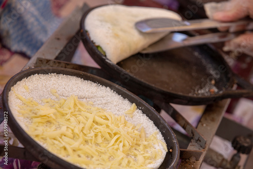 Brazilian street food: beiju of tapioca with cheese photo