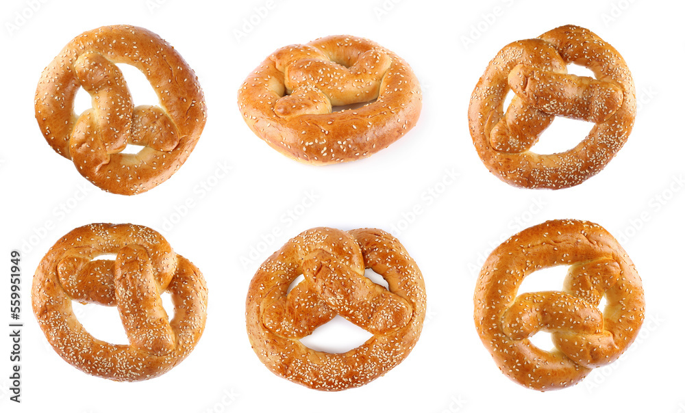 Set with tasty freshly baked pretzels on white background Set with tasty freshly baked pretzels on white background