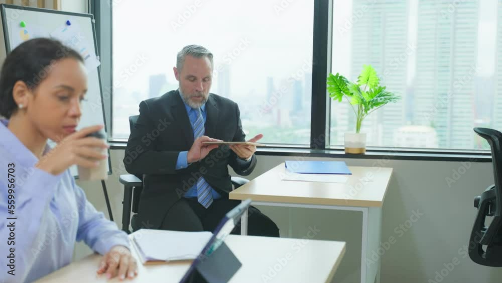 Caucasian businessman leaving from table after finished work in office Caucasian businessman leaving from table after finished work in office
