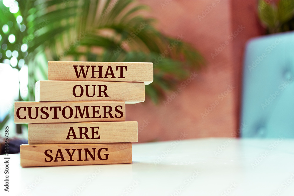 Wooden blocks with words 'What Our Customers are Saying'. Wooden blocks with words 'What Our Customers are Saying'.