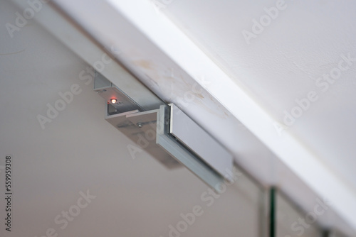 An electromagnetic lock, a maglock or electromagnet lock, is a type of locking device that uses an electromagnet to secure a door in place. It is often mounted on glass doors.
