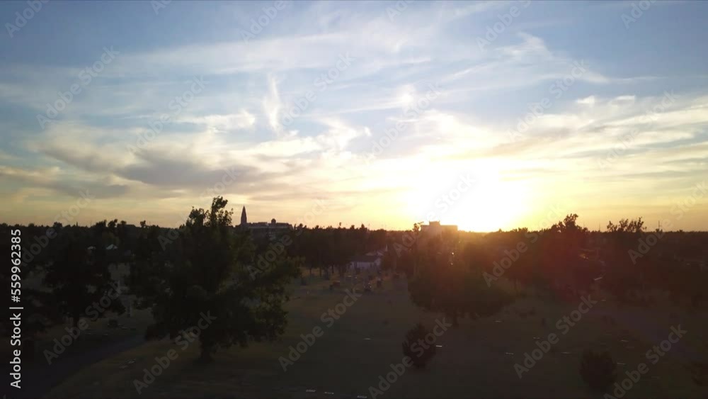 Ascending shot above a cemetery at sunset in Georgia, America Ascending shot above a cemetery at sunset in Georgia, America