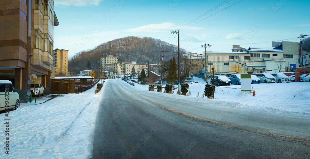 Empty road with beautiful winter small town Empty road with beautiful winter small town