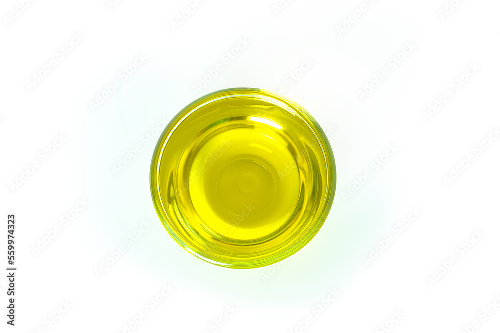 Olive oil in a glass bowl. Good fats. Prepared for cooking ideas. Health care. Olive oil in a glass bowl. Good fats. Prepared for cooking ideas. Health care.
