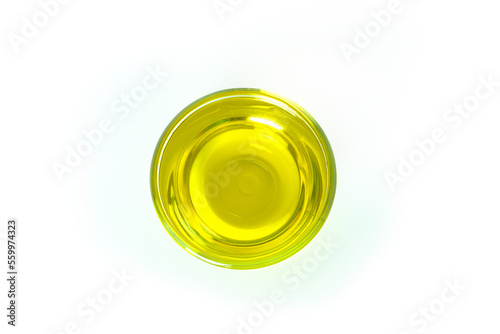 Olive oil in a glass bowl. Good fats. Prepared for cooking ideas. Health care.
