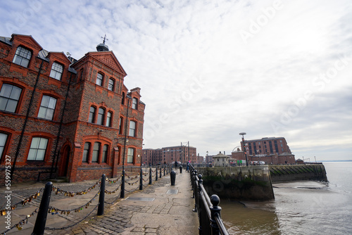 Albert Docks Liverpool , complex of red bricks buildings and warehouses near River Mersey during winter at Liverpool , United Kingdom : 9 March 2018