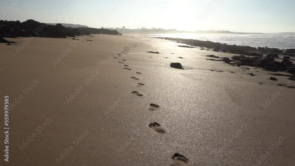 Footprints on the sand in the Atlantic coast. Footprints on the sand in the Atlantic coast.