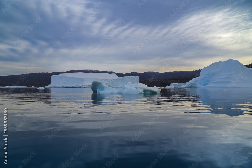 Fototapeta premium Close up of Iceberg floating in the cold waters of the Arctic circle.