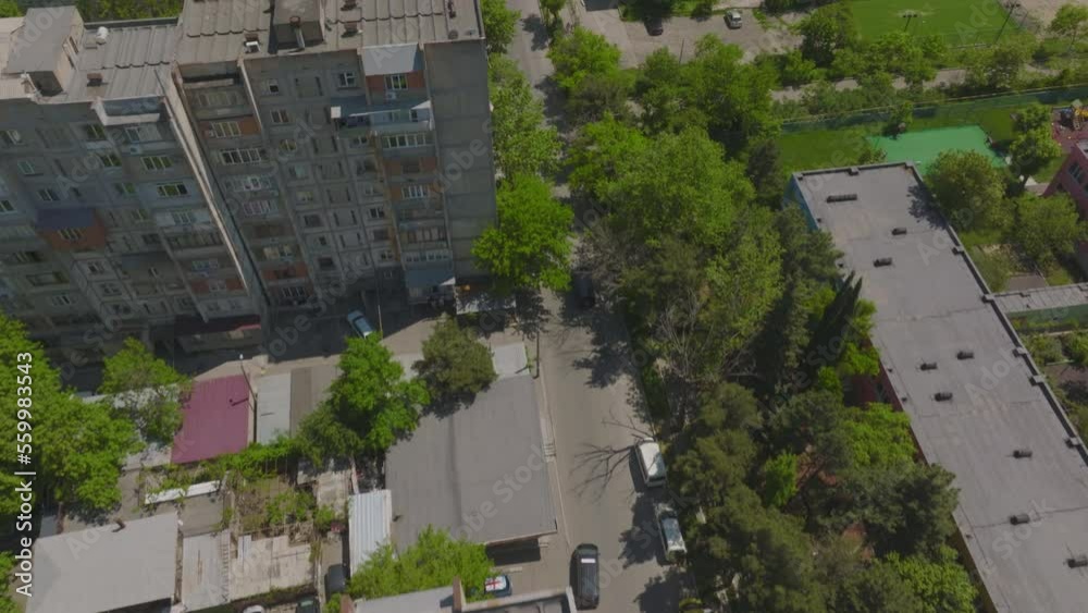 Aerial shot of rooftops and run-down apartment complexes in Georgia