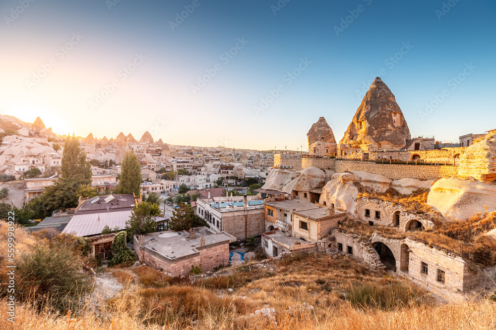 Hotels and houses carved into the rocks of soft volcanic tuff in Cappadocia - one of the wonders of the world in Turkey.