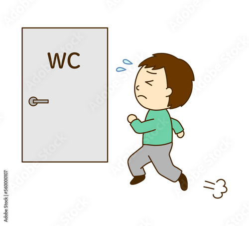 急いでトイレに行く男性