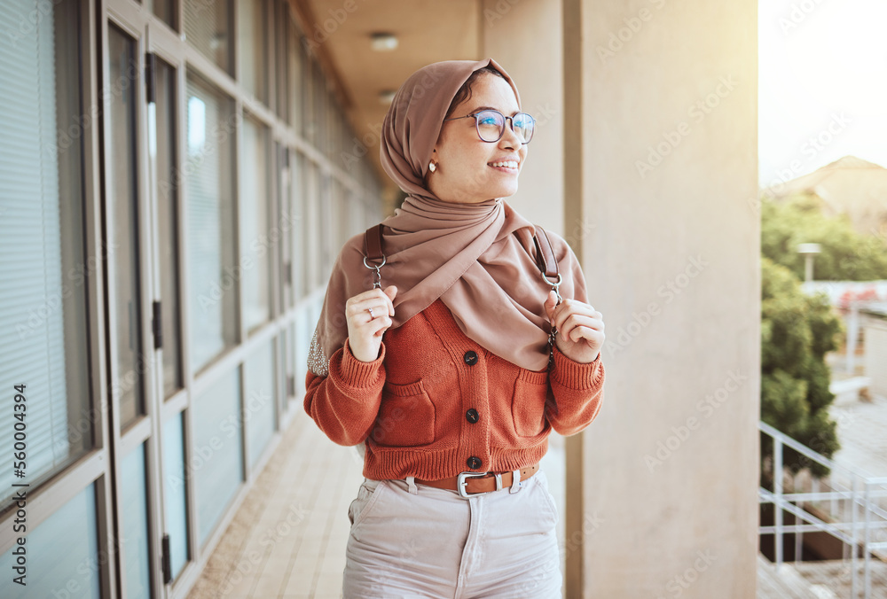 University, Muslim and campus student walking, happy and relax on journey  to class, education learning or lecture study. School, hijab and Islamic  woman, college girl or person on walk in Indonesia Stock-Foto