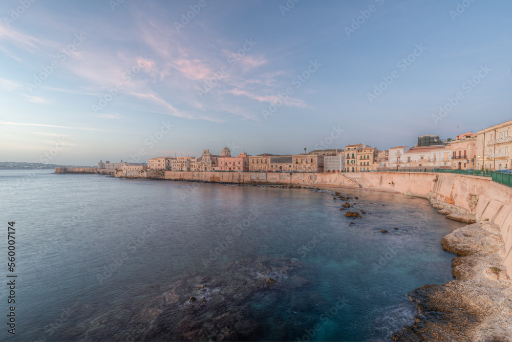 The breathtaking scenery of the Ortigia seafront in Syracuse Sicily in  the sunrise of a new day