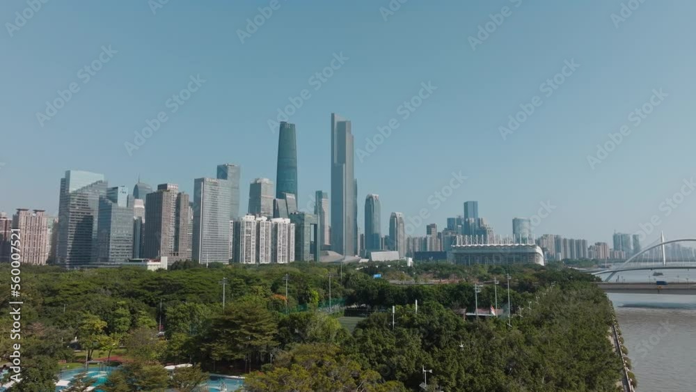 Tianhe District skyline with skyscrapers and office buildings, Guangzhou, China, view from Ershadao island Tianhe District skyline with skyscrapers and office buildings, Guangzhou, China, view from Ershadao island