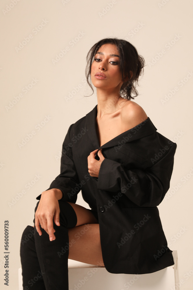 Beauty portrait of young woman posing on the white background. Isolated. Beauty portrait of young woman posing on the white background. Isolated.