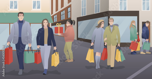 People walk down the street after shopping