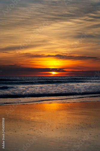 sunset at coast of the sea