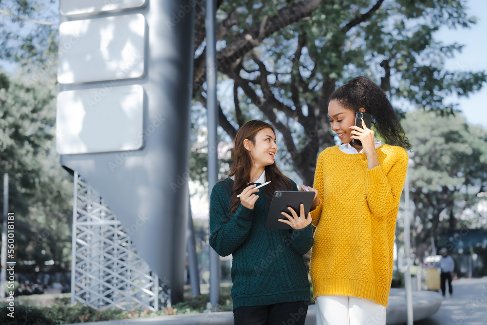 Young friends student african american college happy walking city urban on campus Young friends student african american college happy walking city urban on campus