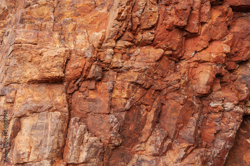 Abstract rock stone background with wall of red mountain texture