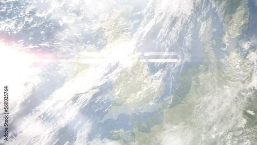 Earth zoom in from outer space to city. Zooming on Salford, UK. The animation continues by zoom out through clouds and atmosphere into space. Images from NASA photo
