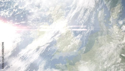 Earth zoom in from outer space to city. Zooming on Wigan, UK The animation continues by zoom out through clouds and atmosphere into space. Images from NASA photo