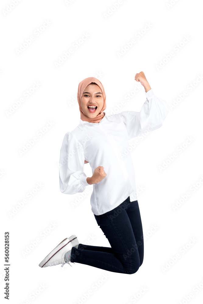 Asian Muslim woman in a headscarf with an excited expression Asian Muslim woman in a headscarf with an excited expression