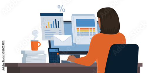 Businesswoman checking business documents on her computer