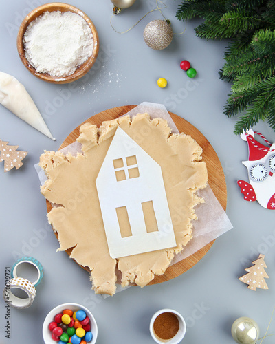 The pattern of a gingerbread house on the dough