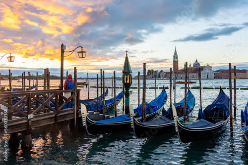 Venice gondolas and San Giorgio Maggiore island at sunset, Italy © Mistervlad